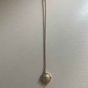 Gold faux cross necklace